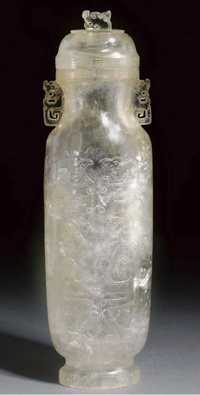 19th century A rock crystal slender elongated vase and cover